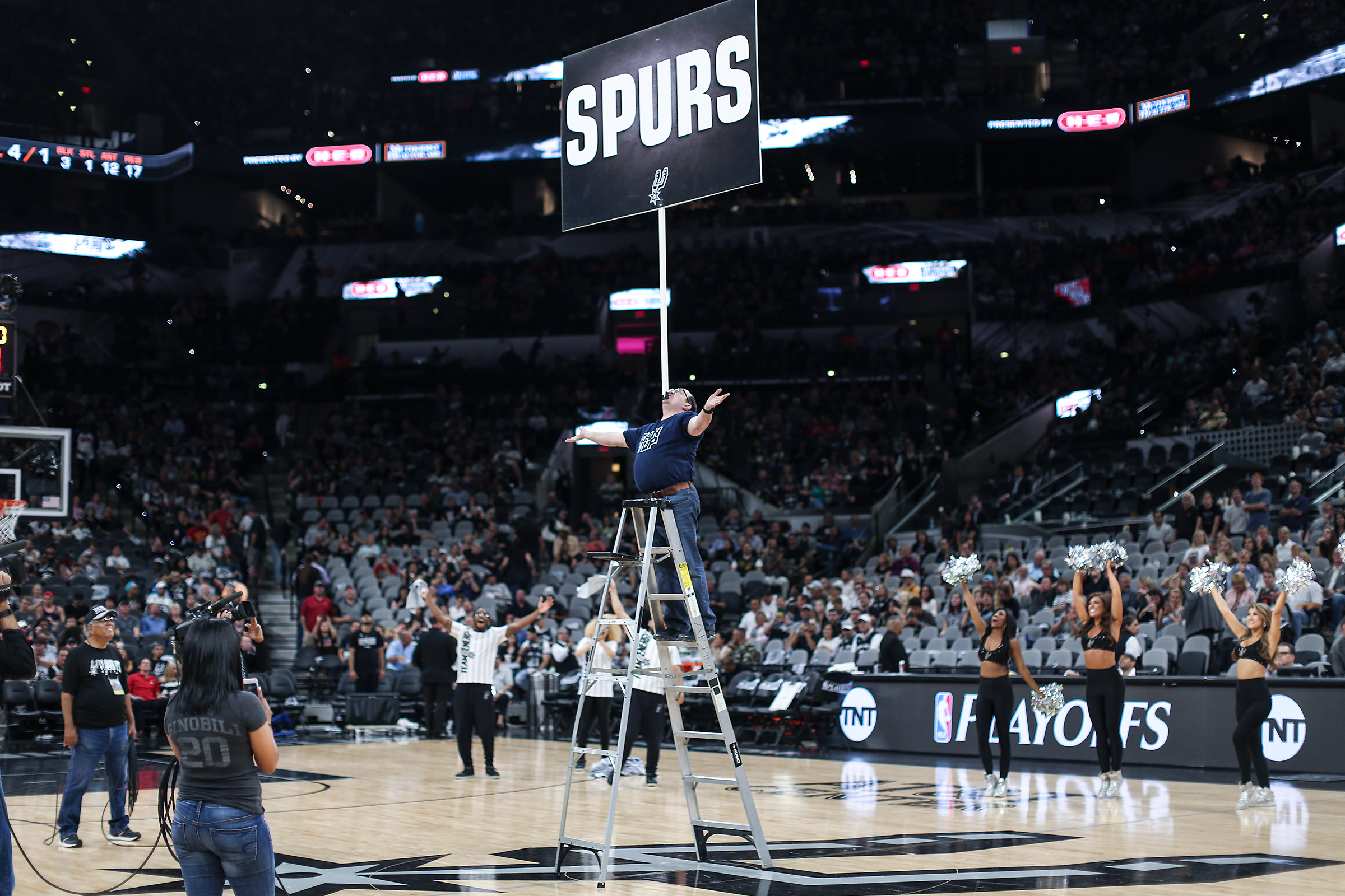 16-foot ladder balance at NBA arena